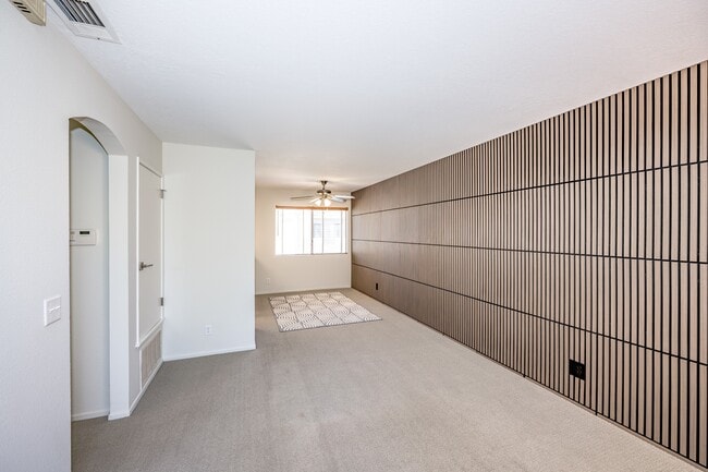 Living room into dining area - 11068 Sharp Ave Unit A