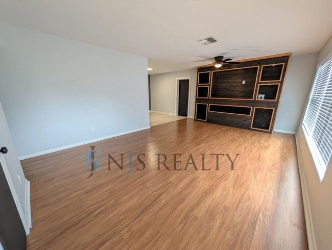Photo - Beautiful 4/2/2 home with a POOL, 1700 Sq. Ft. with fenced yard, TONS of renovations