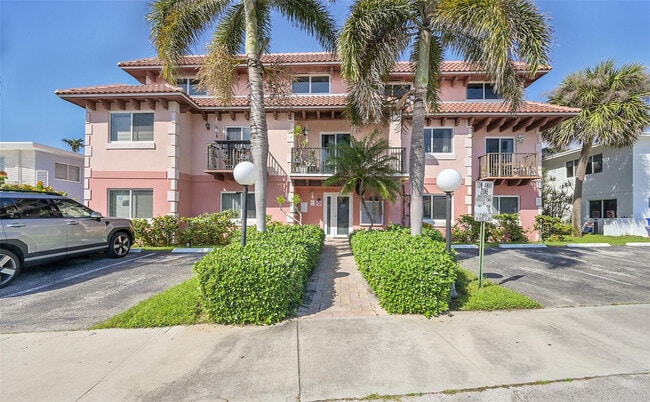 Building Photo - 4525 Poinciana St Unit 10