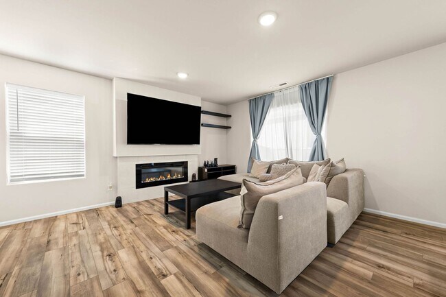 Photo - Spacious 3-Bedroom Home with Bonus Room, Main-Floor Den & Covered Patio Near JBLM