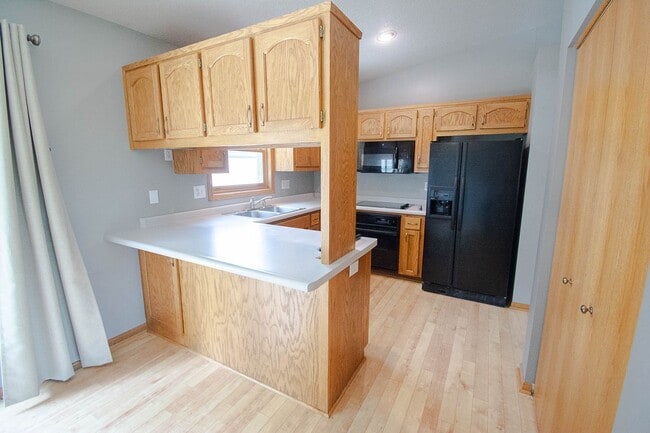 Photo - Pet friendly Country Club Manor home with fenced yard!
