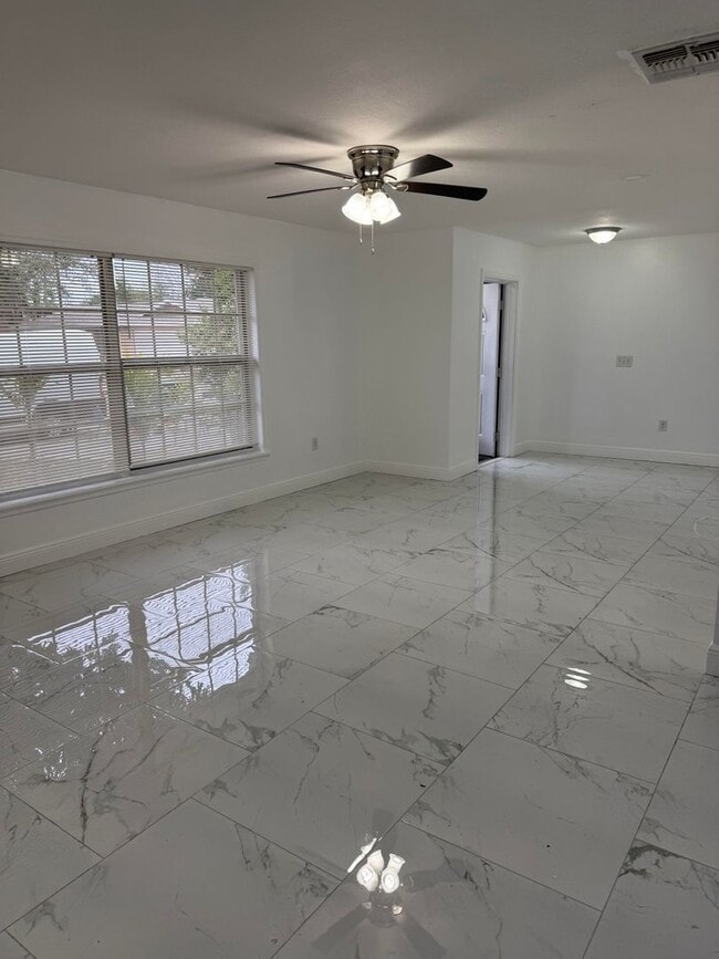 Photo - Recently Remodeled 3-Bedroom Home with Tile Floors, Yard & 2-Car Garage in Orlando