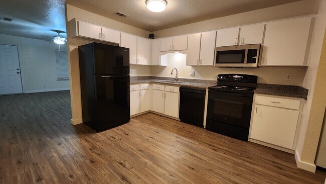 Recently new appliances including microwave and garbage disposal.  Refinished doors with moder pulls
