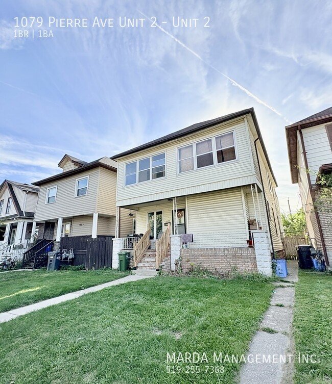 Building Photo - COZY 1 BED/1 BATH UPPER Unit 2