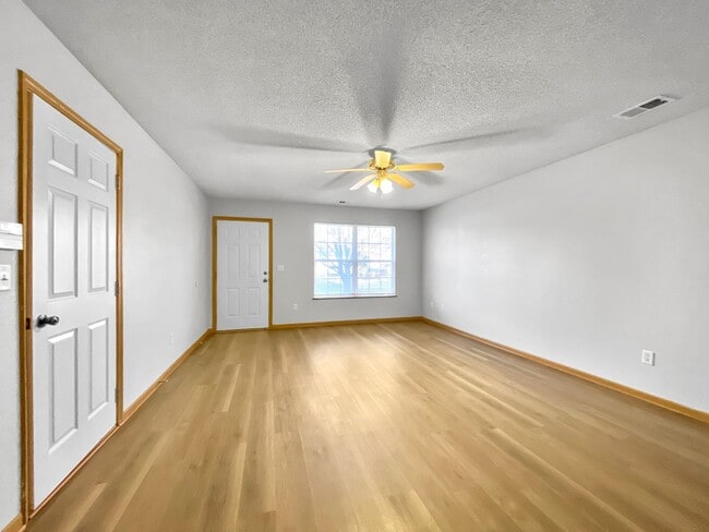 Photo - 3BR/2BA Home for Rent in Grain Valley, MO 64029 | Fenced Yard | Fireplace | Garage | Pet-Friendly