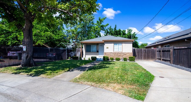 Photo - ALF OFF One Month’s Rent! Updated 3BR Home with Garage & Yard – Prime Sacramento Location