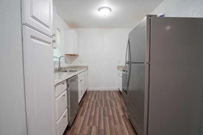 Photo - 4BR Home with LVP Flooring, Open Layout & Large Backyard Near Dogwood
