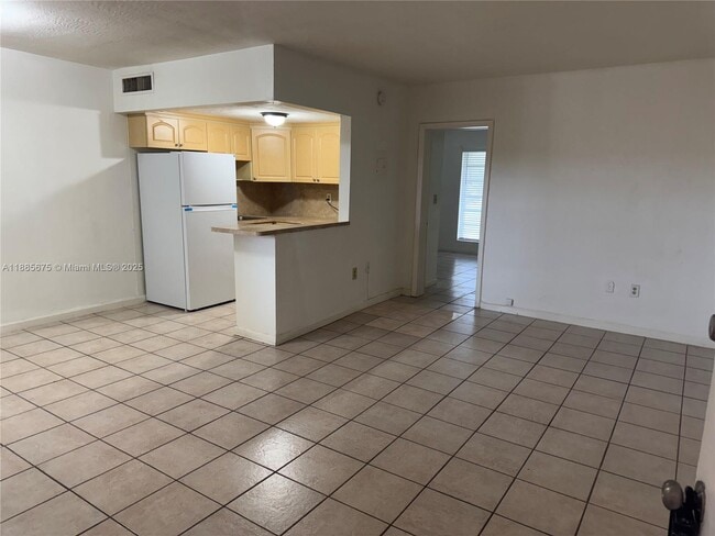 Photo - 1280 W 54th St Unit 310B