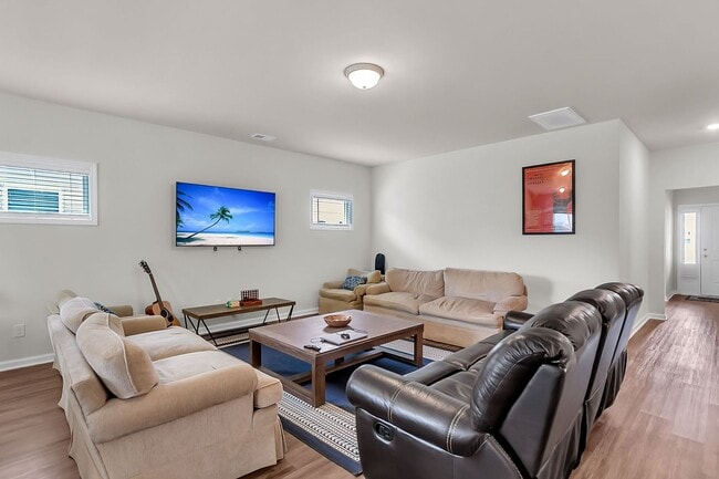 Photo - Spacious 4-Bedroom Home with Modern Upgrad...
