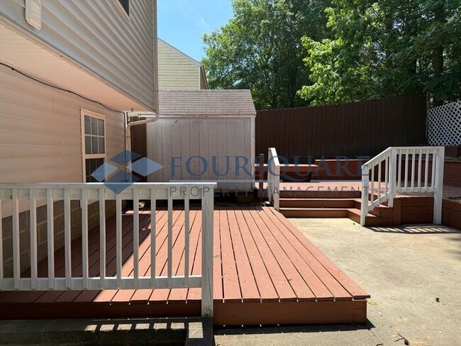 Photo - Spacious 4-Bed / 3-Bath Single-Family Home with Sunroom, Fenced Yard. Convenient to Southeast Ral...