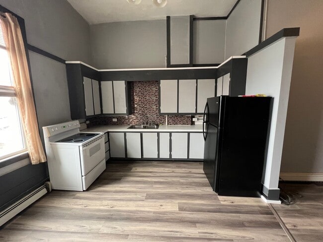 Building Photo - 317 S Clinton Ave Unit Apartment # A