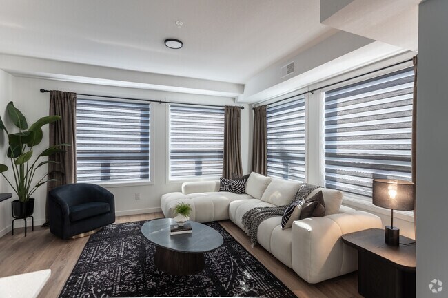 2BR, 2BA - 1045SF - Living Room - The Pointe at Riverview