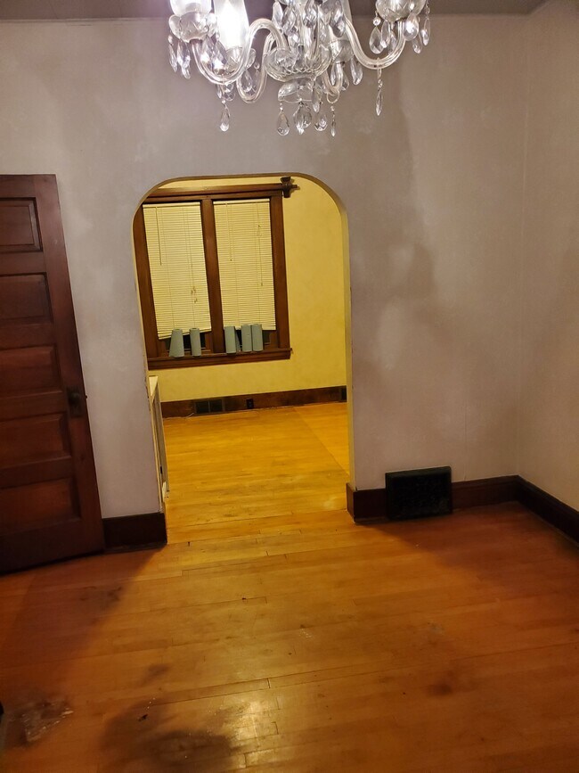 dining room looking into living room - 606 7th St N Unit One