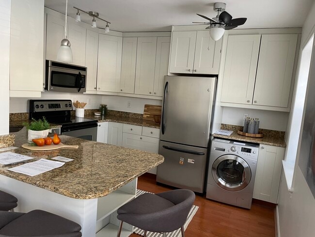 Building Photo - 7036 Strathmore St Unit 109