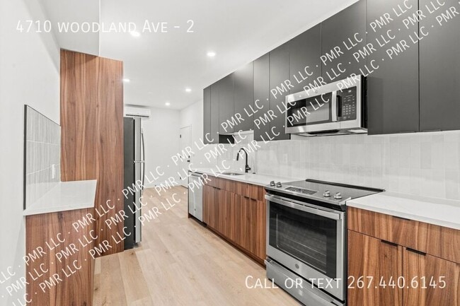 Building Photo - 4710 Woodland Ave Unit 2