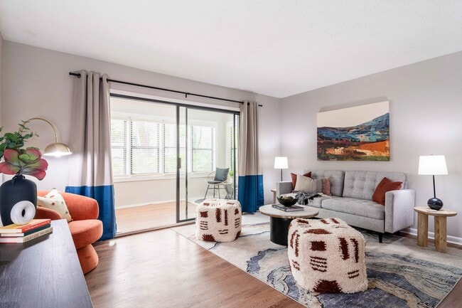 Newly Renovated Living Room with Private Sunroom - Rosemont at East Cobb Apartments