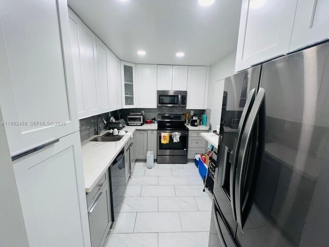 Photo - 400 Kings Point Dr Unidad 1504