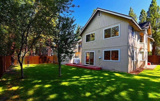 Photo - Large upscale home with large garage