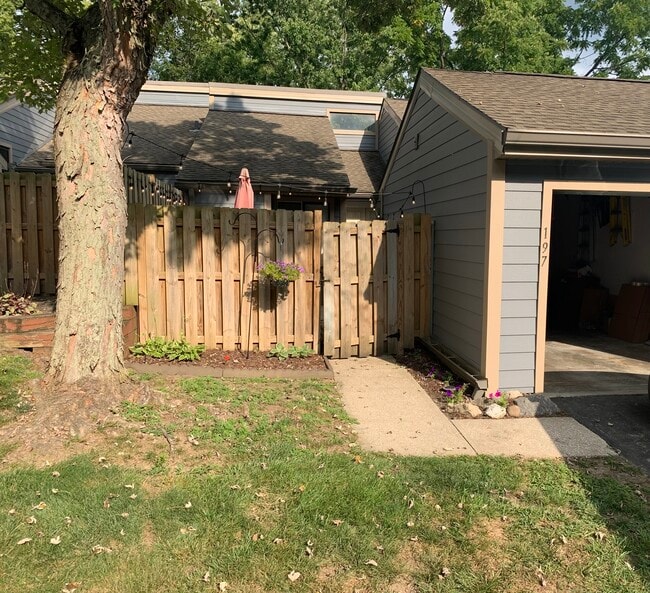 Gated front entrance attached to garage - 197 Sugarwood Ln Unit 197