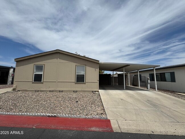 Photo - 8601 N 103rd Ave House
