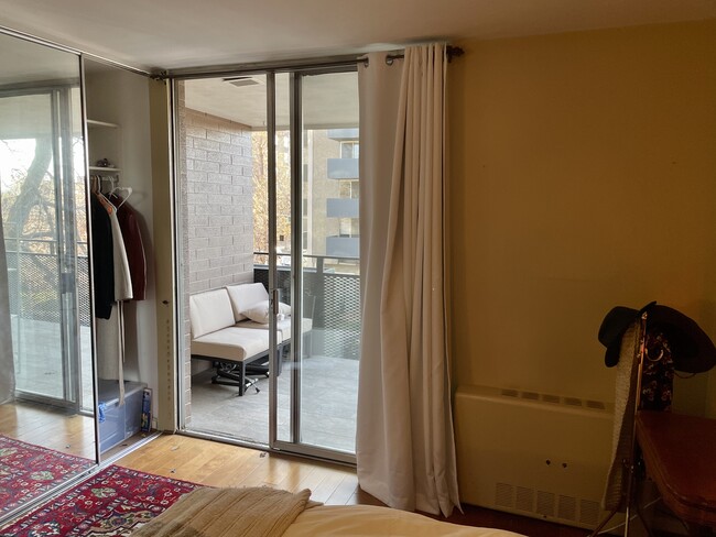 Bedroom has access to balcony - 1200 Vine St Unit 3D
