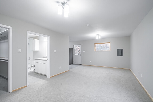 Berber carpet and tile floors - 831 S French Ave Unit 1