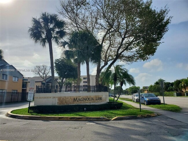 Building Photo - 7423 SW 152nd Ave Unit 10-106