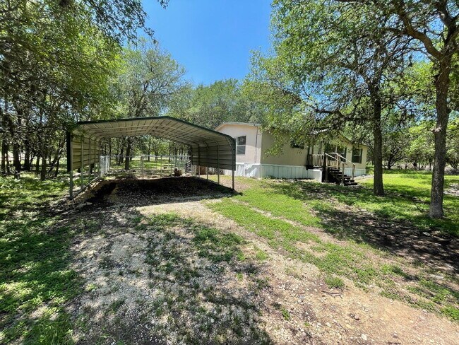 Photo - 3 bed 2 bath on one acre lot. New vinyl fl...
