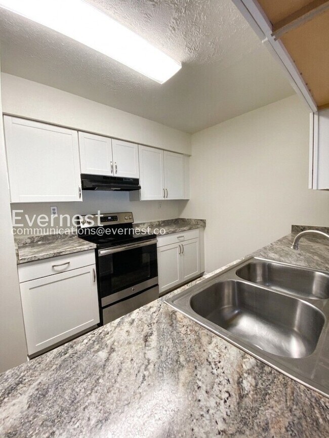 Photo - 3 Bed, 1.5 Bath Townhome with Fenced Yard / Available Soon!