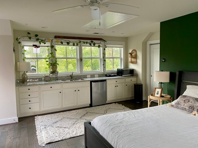 Kitchenette with north facing windows overlooking tree-lined Custis Ave.