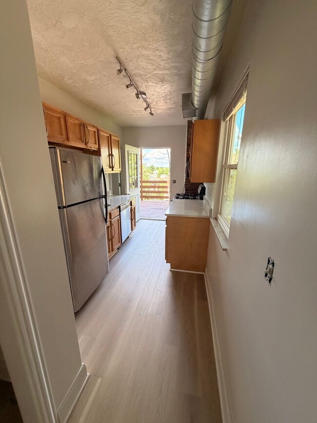 Kitchen to deck - 128 Cohassett St Unit 1