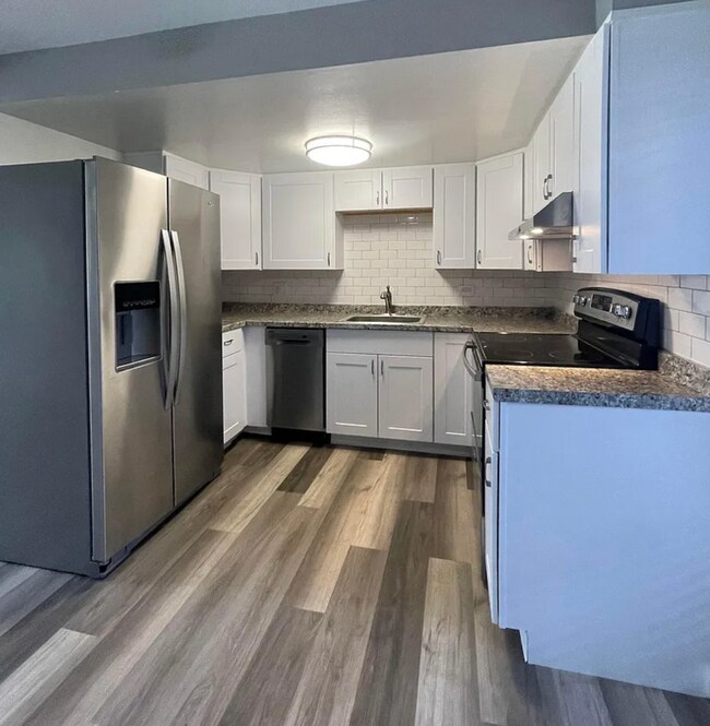 Photo - Beautifully Renovated 2 Bedroom Apartment with In-Unit Laundry & A/C Unit 2