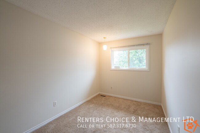 Photo - Townhouse featuring Extra Storage, Assigned Parking & Condo Amenities