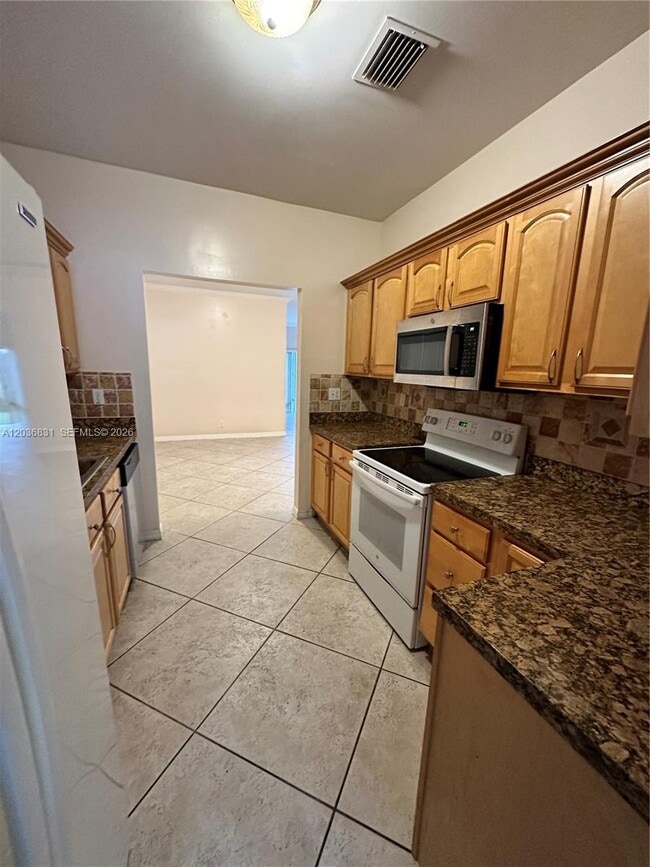 Photo - 2988 NW 7th Ct