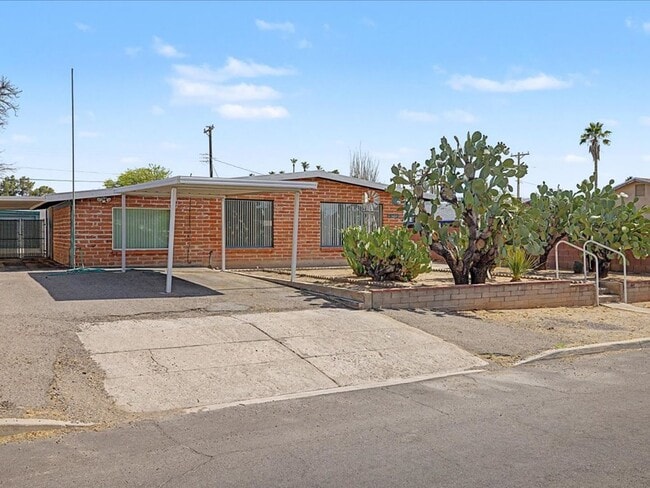 Photo - Charming 3-Bedroom Home with Spacious Yard & Versatile Storage!