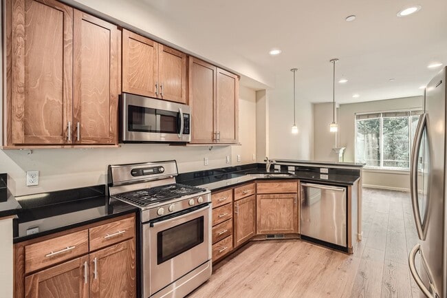 Photo - Charming three-level Townhome available for immediate move in.