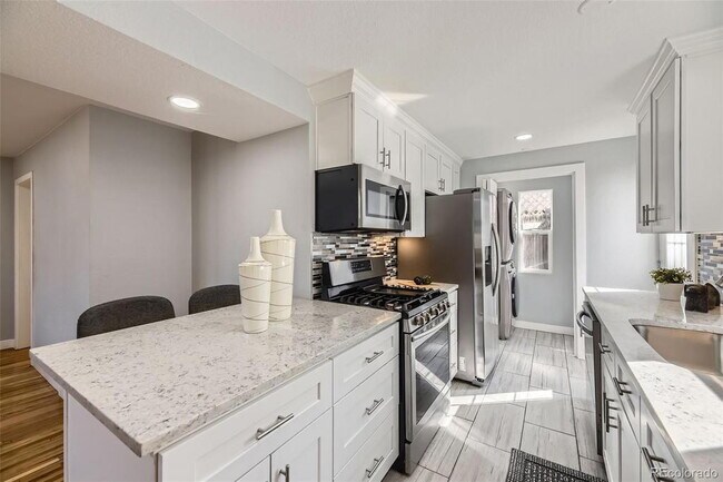 Photo - "Charming 3-Bed SFH Denver Gem with Gleaming Hardwood Floors"
