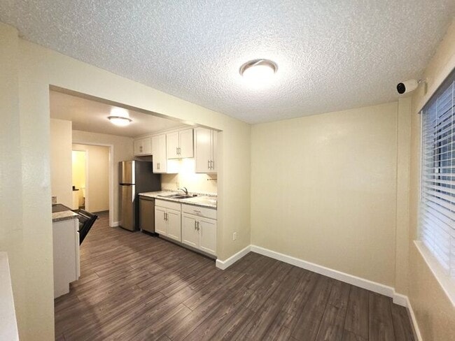 Photo - Large 2 bedroom 1.5 bath 2 car garage townhouse new custom flooring and paint throughout with new...