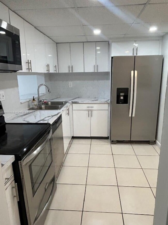 Building Photo - 8540 SW 133rd Avenue Rd Unit 208