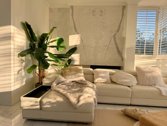 Bright living area, adorned with polished marble - 17368 W Sunset Blvd Condo Unit A 301