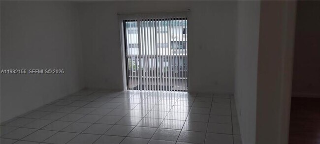 Building Photo - 5861 NW 16th Pl Unit 309