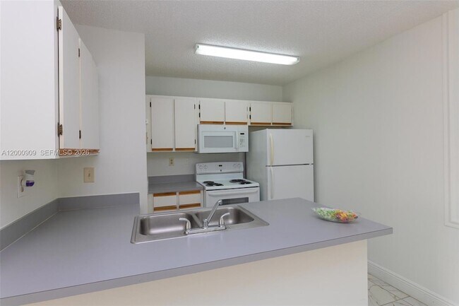 Photo - 18304 NW 68th Ave Unit L