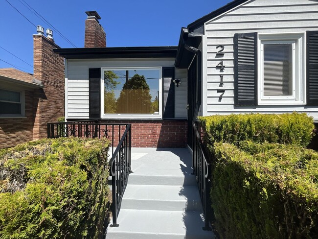 Photo - Bright and Welcoming Home with Modern Kitchen, Expansive Backyard & Flexible Living Space