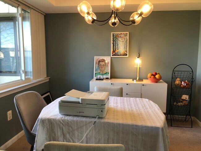 Apartment has wall-to-wall windows in dining room and living room. - 2103 Walsh View Ter Unidad 302