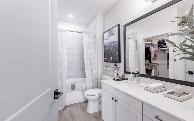 Tub and shower in one tiled surround, so either works on a given day.