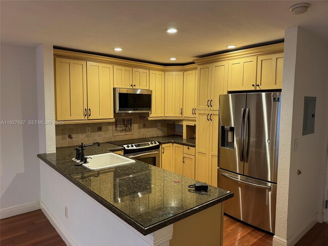 Building Photo - 7845 Camino Real Unit O-311