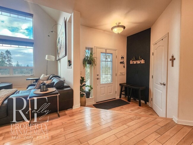 Photo - Light-Filled View Home with Vaulted Ceilings & Warm Wood Finishes