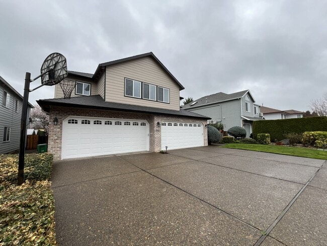 Photo - Grand 5 Bedroom Home Featuring 19ft Ceilings, Family Room & Main-Level Suite