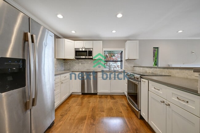 Photo - Move-In Ready 4 Bedroom Home in Prime Bellevue Location