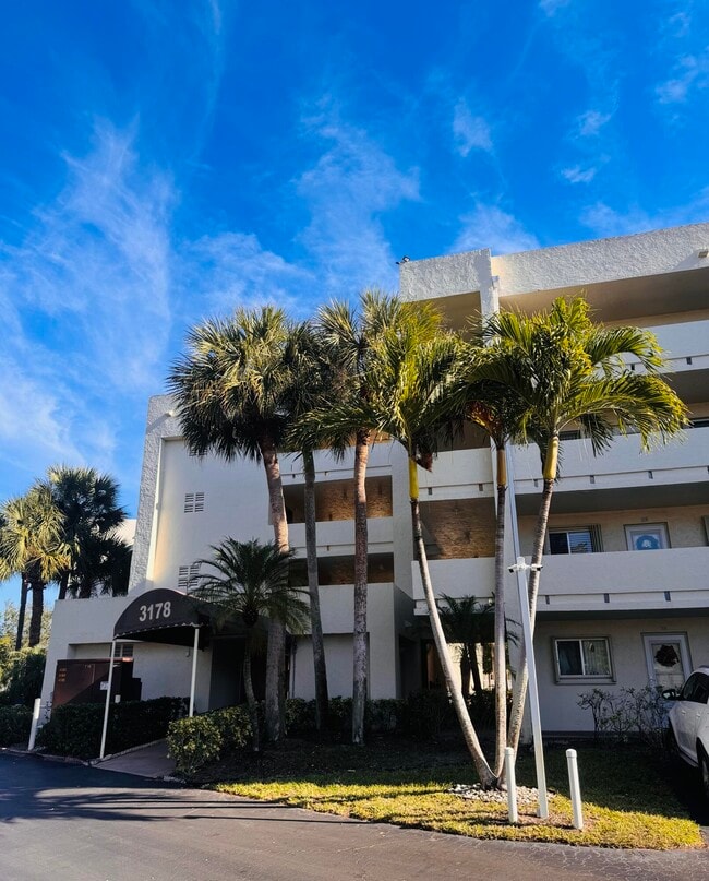 Building Photo - 3178 Via Poinciana Unit 303